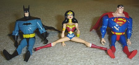Batman, Wonder Woman, and Superman action figures